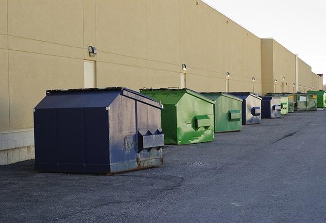 metal dump boxes positioned for construction cleanup in Farmingdale